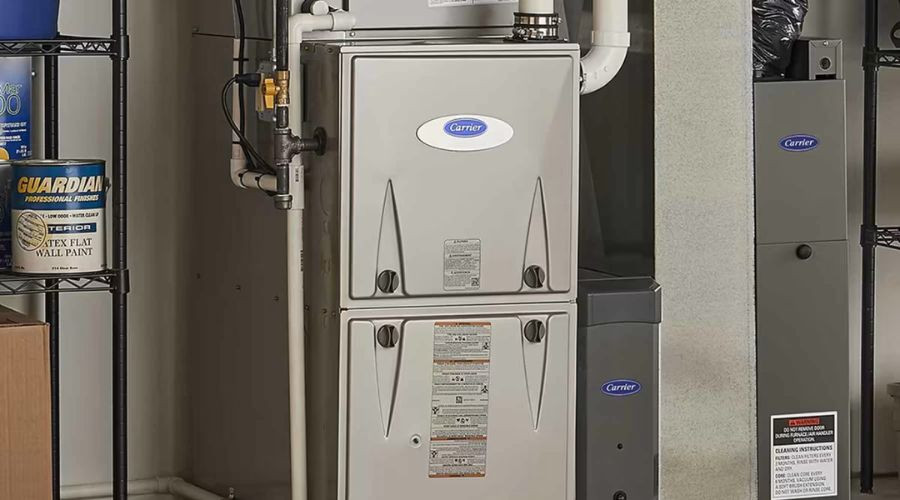 Carrier furnace in a residential setting, showcasing essential heating equipment relevant for homeowners considering new heating system installation.